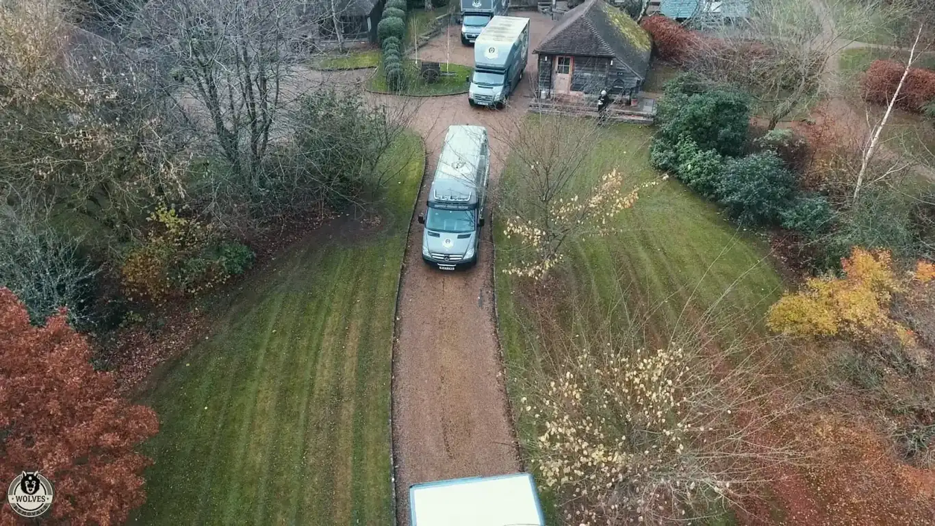 Aerial view of Wolves Storage Sussex vans collecting from a West Sussex property — storage in Ashington, West Sussex