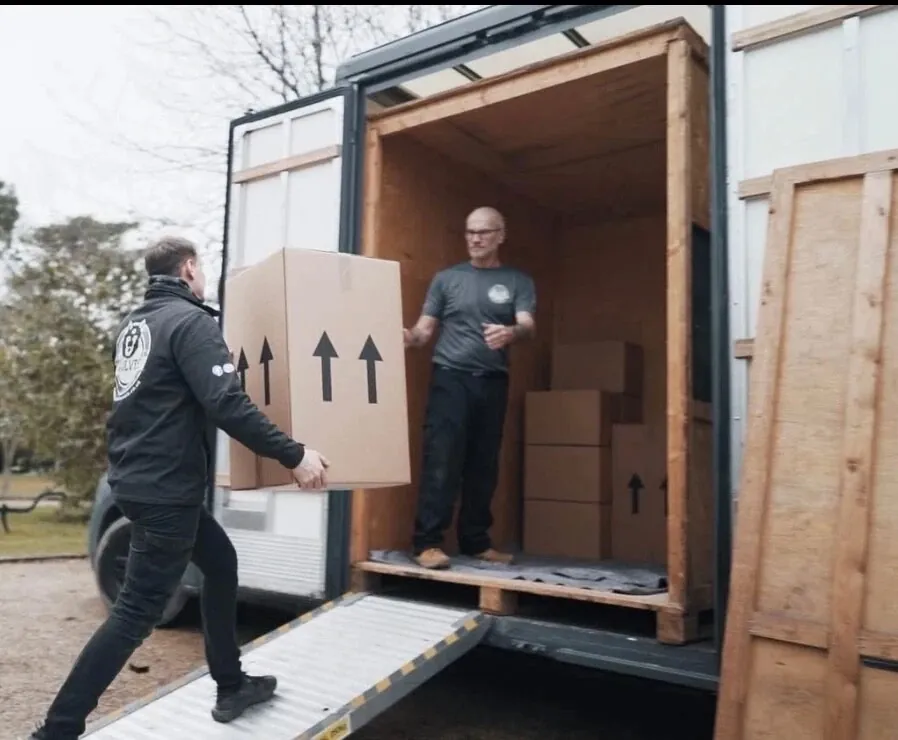 Team packing belongings for storage