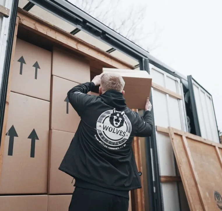 A Wolves Storage Sussex team member loading packed boxes into the van for storage &mdash; Wolves Storage Sussex serving Brighton