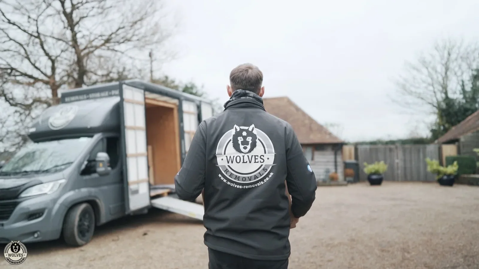 Wolves Storage Sussex team member walking to the Luton van on a managed collection in West Sussex — storage in Lancing, West Sussex